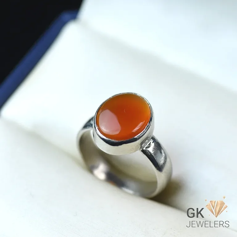Silver ring with orange agate stone