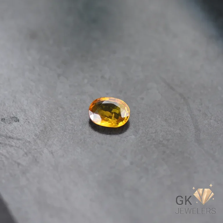 Oval citrine gemstone with vibrant yellow-orange hue