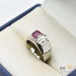 Silver ring featuring a 2-carat emerald-cut ruby gemstone from Madagascar, set in a handmade setting with decorative detailing