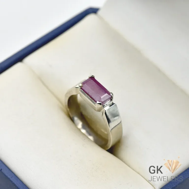 Emerald-cut natural ruby ring with 2-carat pinkish red gemstone set in handmade silver band