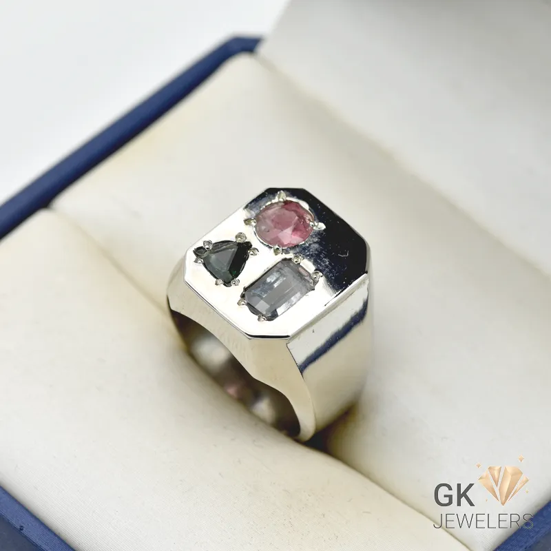 Silver ring featuring a 3+ carat natural multi-color tourmaline gemstone with exceptional transparency and clarity, set in a handmade artisan setting