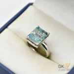 Square-cut 5-carat natural tourmaline gemstone in light blue, set in handmade silver ring