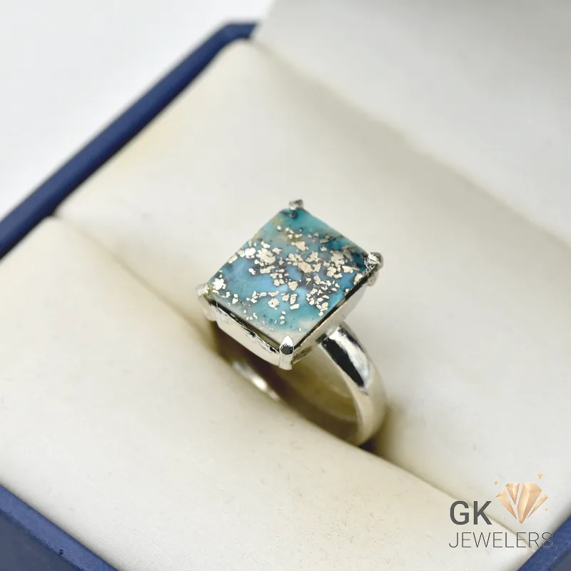 Square-cut 5-carat natural tourmaline gemstone in light blue, set in handmade silver ring