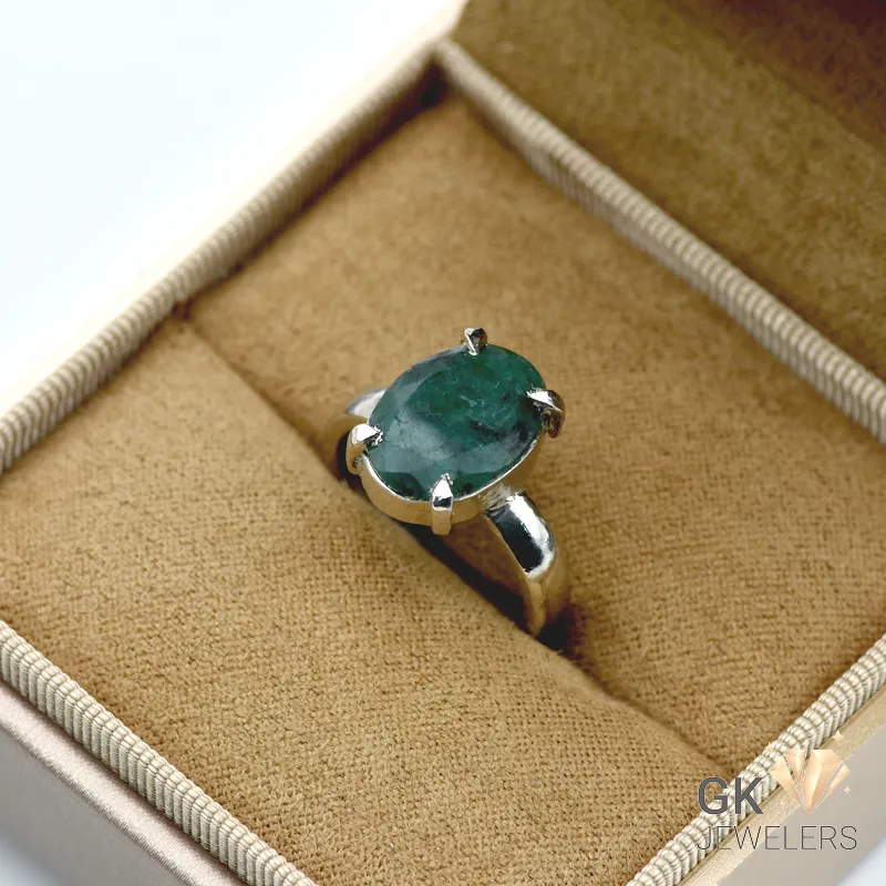 Oval-cut Zambian emerald gemstone set in handmade sterling silver ring, size 14