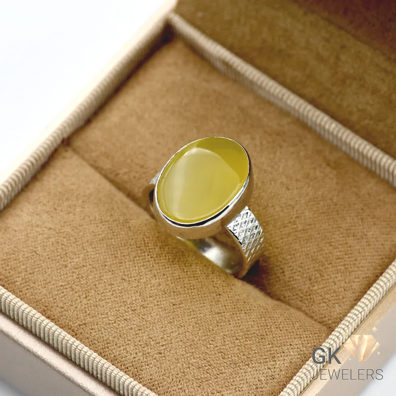 Yellow oval Agate gemstone set in handmade sterling silver ring with diamond details, weighing 5.29g