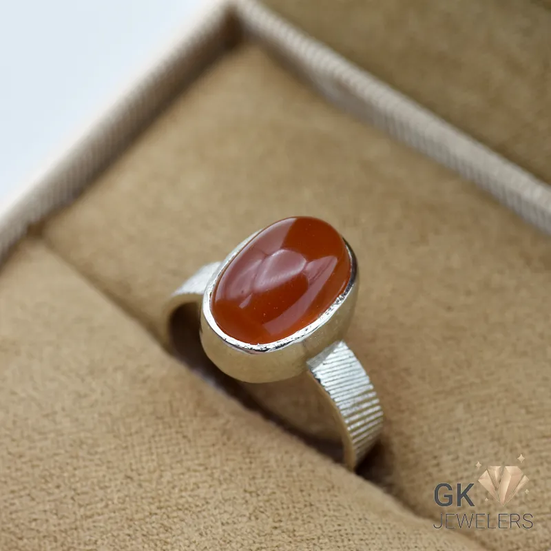 Handmade silver ring featuring a vibrant orange agate gemstone from Iran, size 15