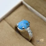 Handmade silver ring featuring an oval blue turquoise gemstone with diamond details on the band, size 12, made in Iran