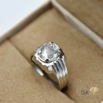 Silver ring featuring a large, oval-cut golden topaz gemstone from Katlang, set in a handmade silver band