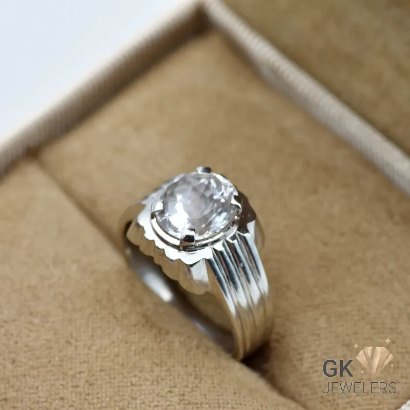 Silver ring featuring a large, oval-cut golden topaz gemstone from Katlang, set in a handmade silver band