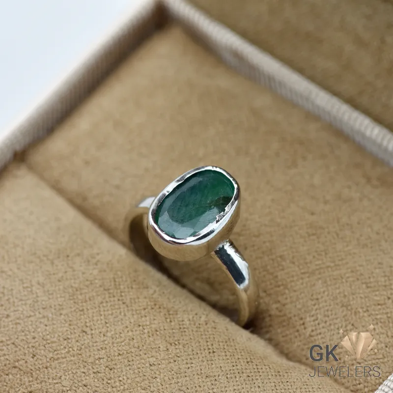 Silver ring with oval-cut Zambian emerald gemstone, handmade setting, translucent green color, size 9