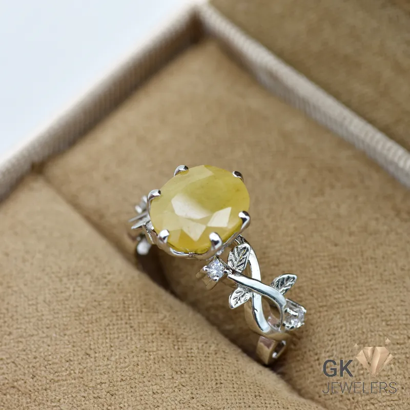 Yellow sapphire (Pukhraj) ring featuring 4.80-carat oval-cut gemstone in silver (Chandi) setting, handmade craftsmanship, size 15