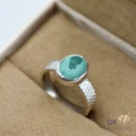 Oval malachite gemstone set in handmade sterling silver ring with textured band, size 15, weighing 3.86g