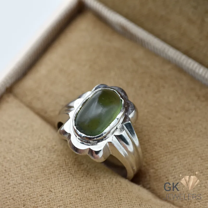 Translucent oval-cut Russian jade gemstone in handmade silver ring setting, size 15