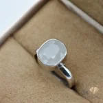 White sapphire gemstone ring with silver band and handmade setting, weighing 7.45 carats, sourced from Sri Lanka