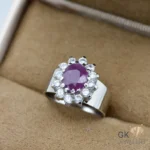Pinkish red ruby gemstone surrounded by diamonds, set in handmade silver ring, size 13, weighing 4.56g, from Madagascar