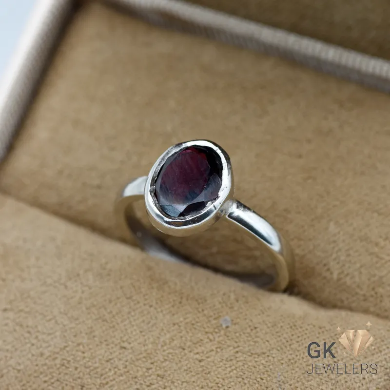 Purple garnet gemstone set in handmade sterling silver ring, size 15, originating from Africa