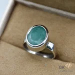 Oval-cut natural emerald gemstone set in silver ring, size 15, Zambia origin, 5.40g weight