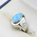 Silver ring featuring an oval blue turquoise stone, handmade setting, size 20