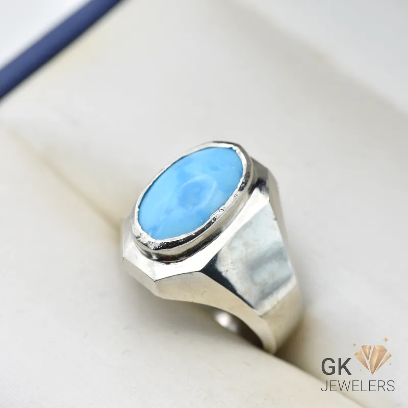 Silver ring featuring an oval blue turquoise stone, handmade setting, size 20