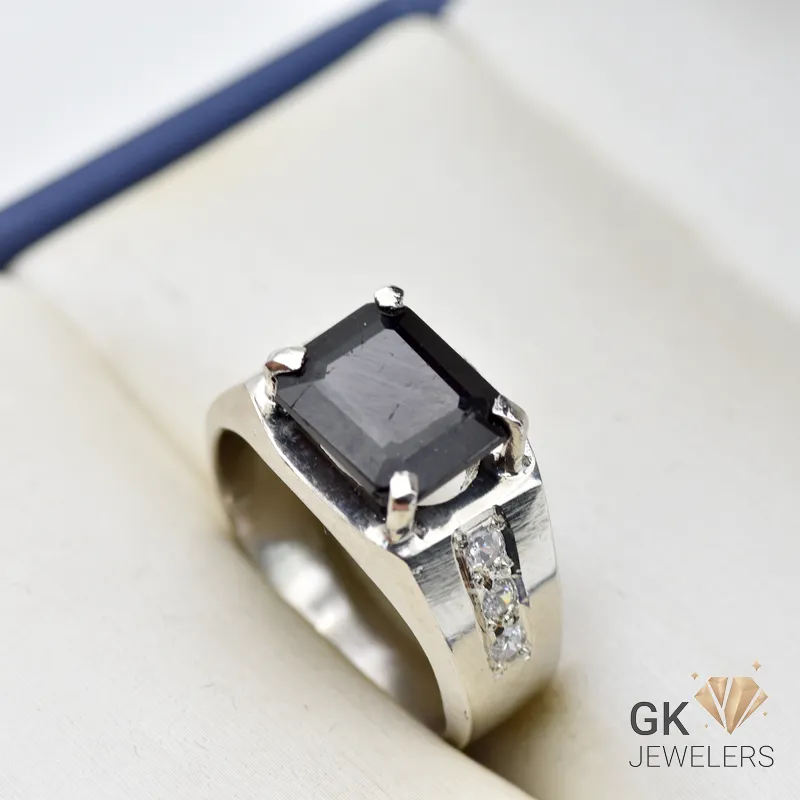 Black tourmaline gemstone set in handmade silver ring with emerald cut and geometric accents, size 20