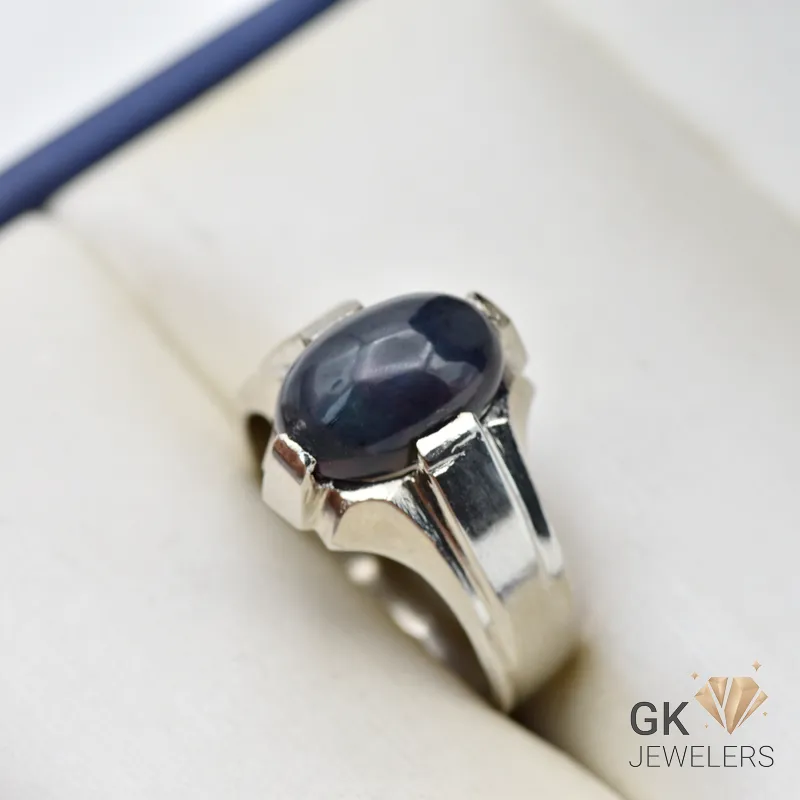 Black opal gemstone set in sterling silver ring, handmade with translucent depths and inner fire, size 21