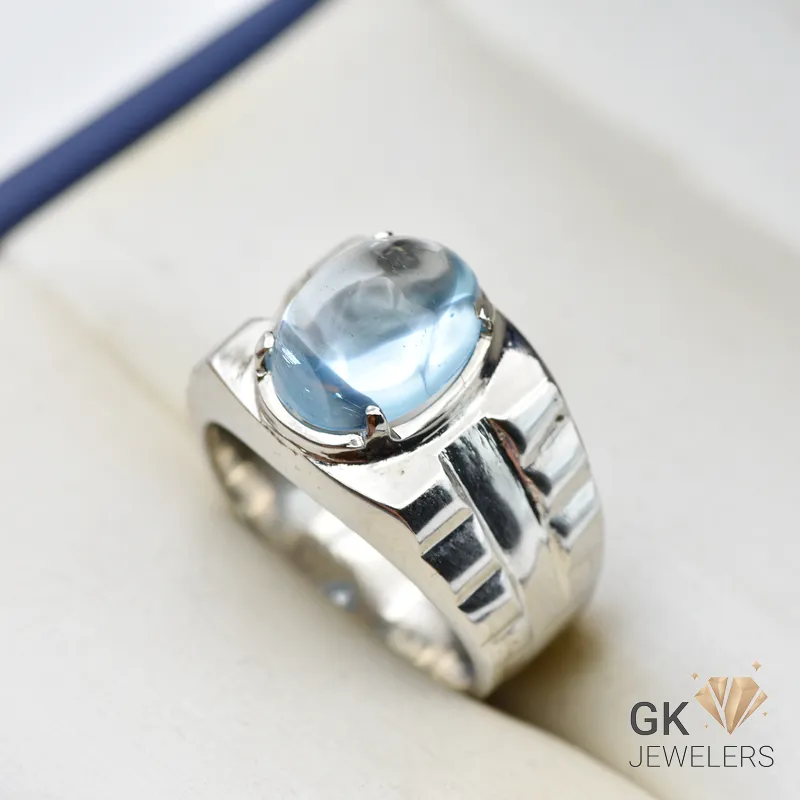 Silver ring featuring an oval-cut transparent blue topaz gemstone from Brazil, handmade setting, size 20