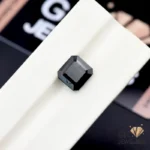 Square-cut 6.45-carat black tourmaline gemstone on white display, Afghanistan origin