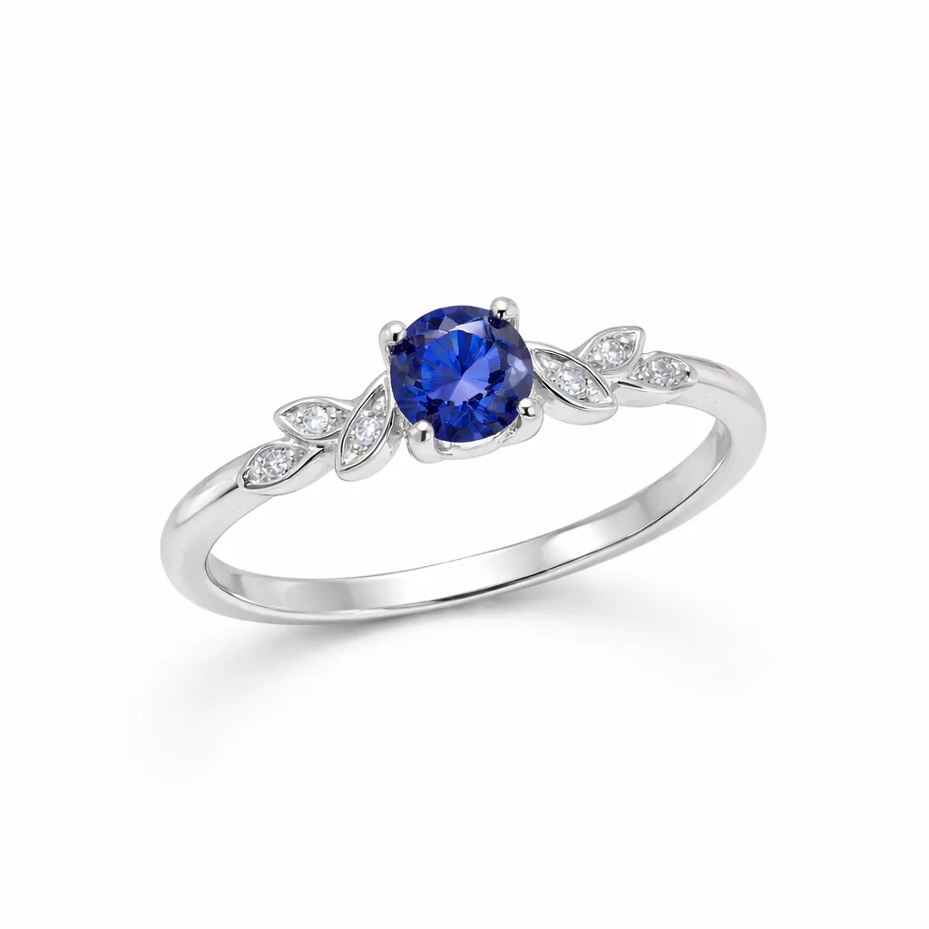 Silver ring with round blue gemstone and marquise diamonds on band