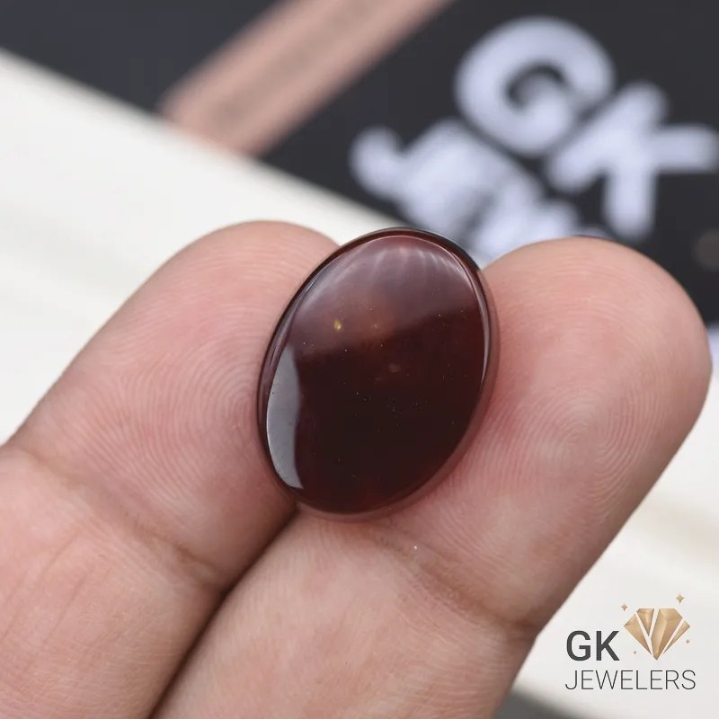 natural aqeeq 17ct dark brown oval stone, GK Jewelers Pakistan authentic gemstone photo