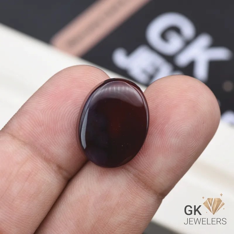 natural aqeeq 17.45ct dark brown oval stone, GK Jewelers Pakistan authentic gemstone photo