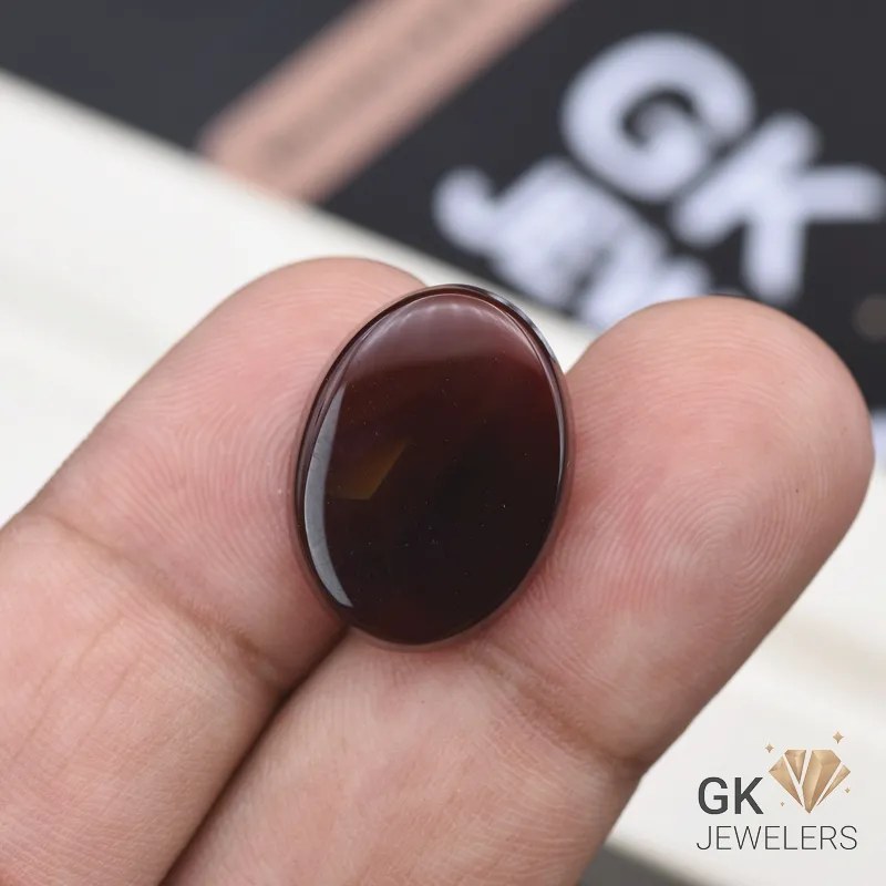 natural aqeeq 17.85ct dark brown oval stone, GK Jewelers Pakistan authentic gemstone photo