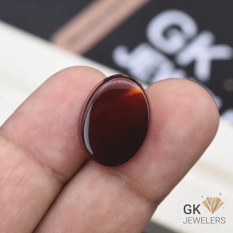 natural aqeeq 17.85ct dark brown oval stone, GK Jewelers Pakistan authentic gemstone photo