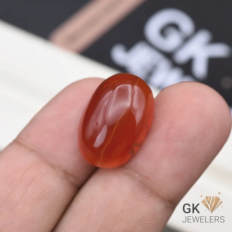 natural aqeeq 24ct orange oval stone, GK Jewelers Pakistan authentic gemstone photo