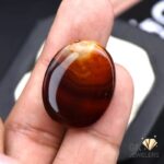 natural aqeeq 33.05ct brown oval stone, GK Jewelers Pakistan authentic gemstone photo