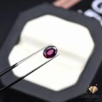natural almandine garnet 1.50ct purplish red oval stone, GK Jewelers Pakistan authentic gemstone photo
