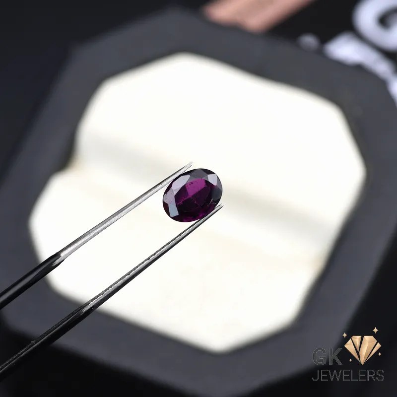 natural almandine garnet 1.85ct purplish red oval stone, GK Jewelers Pakistan authentic gemstone photo