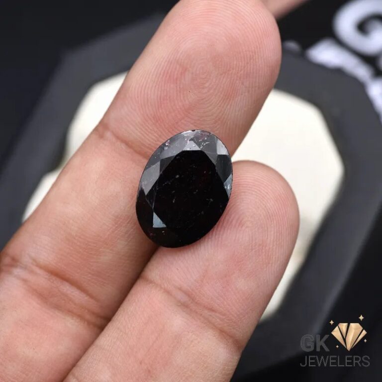 natural almandine garnet 11ct purplish red oval stone, GK Jewelers Pakistan authentic gemstone photo