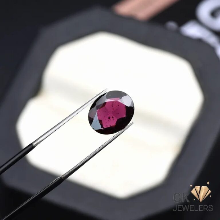 natural almandine garnet 3.15ct purplish red oval stone, GK Jewelers Pakistan authentic gemstone photo