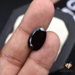 natural almandine garnet 7.60ct purplish red oval stone, GK Jewelers Pakistan authentic gemstone photo