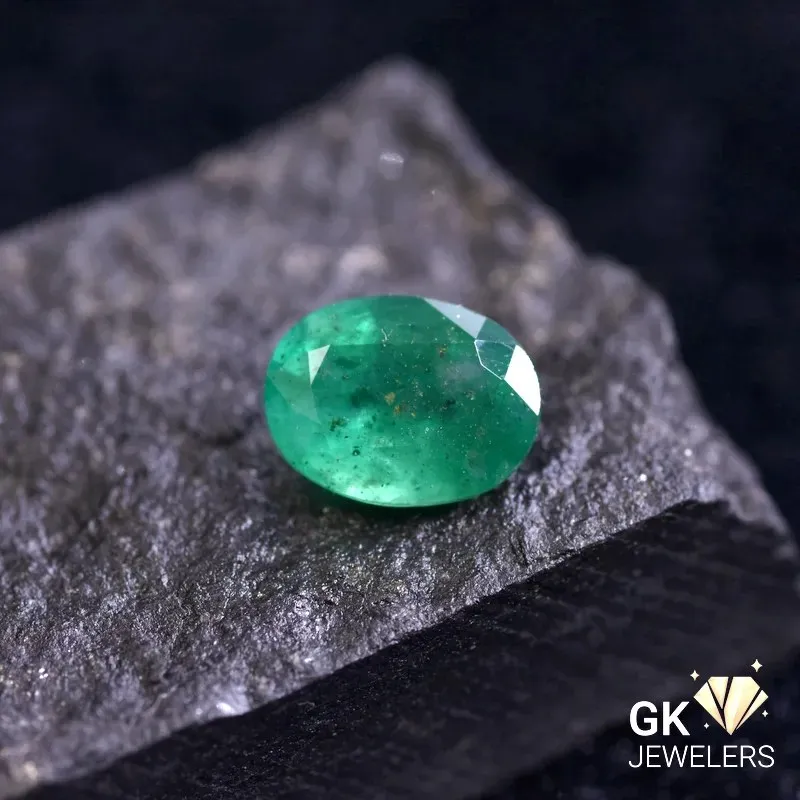 natural emerald 1.8ct green oval stone, GK Jewelers Pakistan authentic gemstone photo