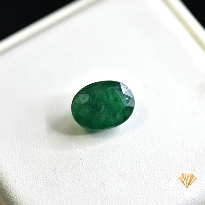 natural emerald 5.95ct green oval stone, GK Jewelers Pakistan authentic gemstone photo