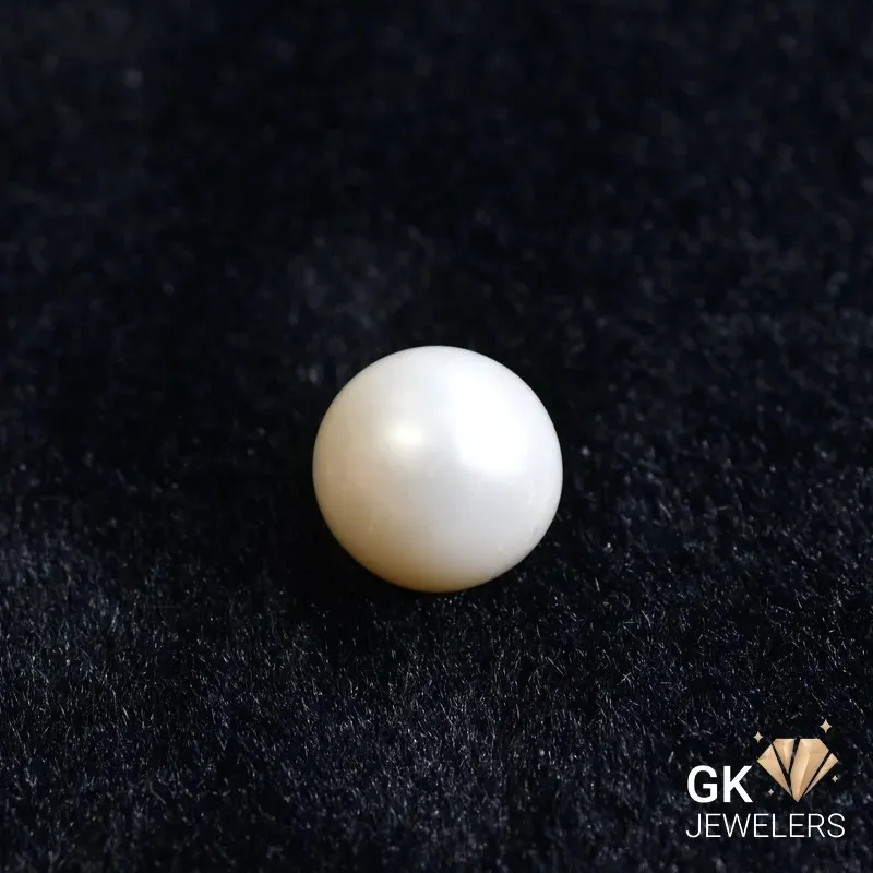 natural south sea pearl 21.35ct off-white round stone, GK Jewelers Pakistan authentic gemstone photo