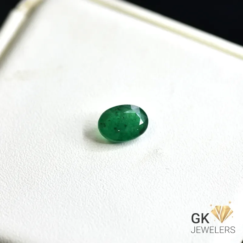 natural emerald 1.47ct green oval stone, GK Jewelers Pakistan authentic gemstone photo
