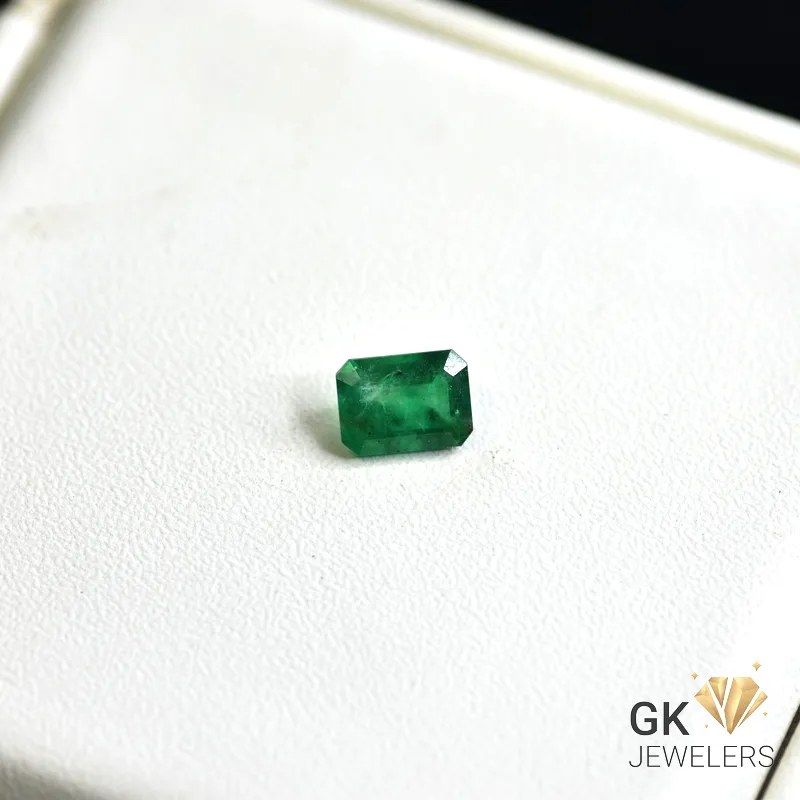 natural emerald 0.85ct green emerald cut stone, GK Jewelers Pakistan authentic gemstone photo