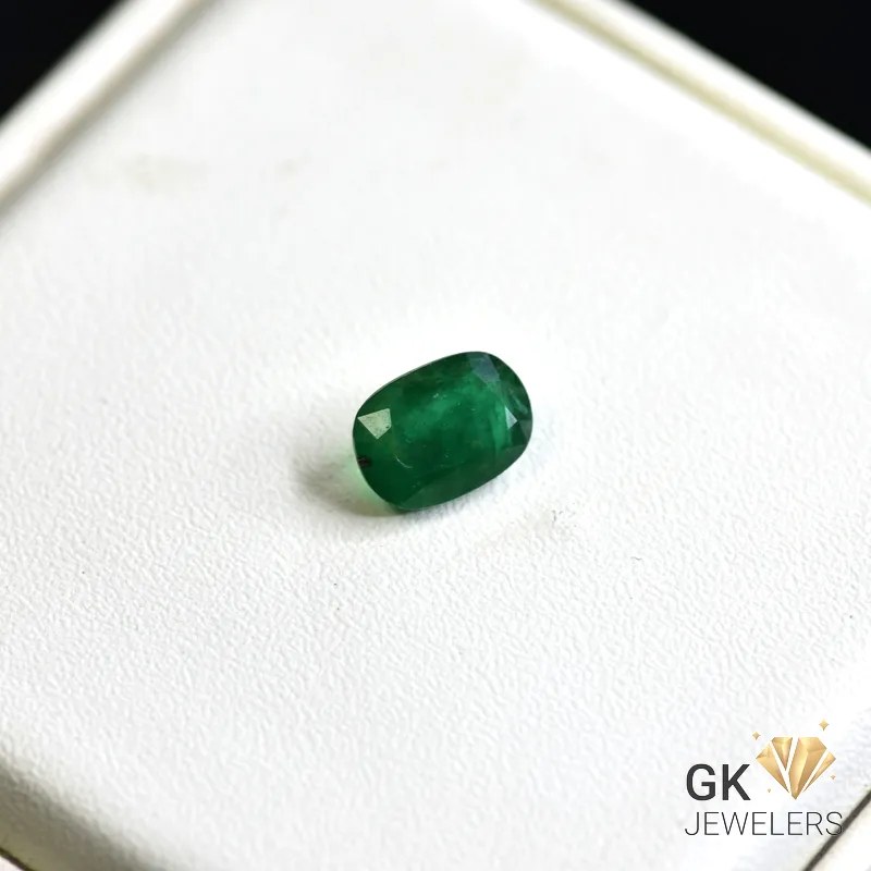 natural emerald 1.58ct green oval cut stone, GK Jewelers Pakistan authentic gemstone photo