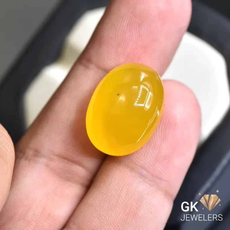 natural agate 26.51ct yellow oval stone, GK Jewelers Pakistan authentic gemstone photo