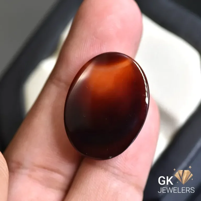 natural agate 25.57ct black oval stone, GK Jewelers Pakistan authentic gemstone photo