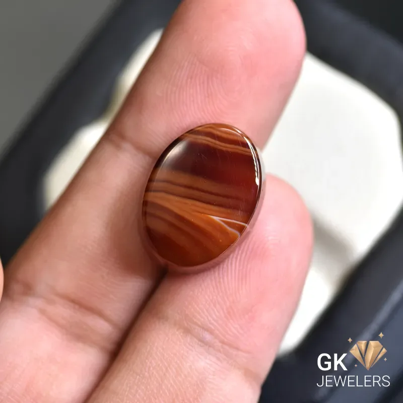 natural agate 18.02ct brown oval stone, GK Jewelers Pakistan authentic gemstone photo