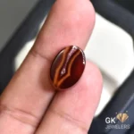 natural agate 14.08ct brown oval stone, GK Jewelers Pakistan authentic gemstone photo