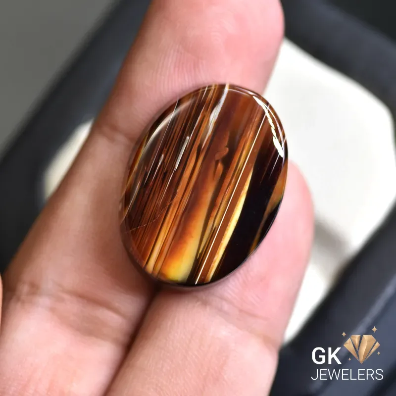 natural agate 34.10ct brown oval stone: GK Jewelers Pakistan authentic gemstone photo